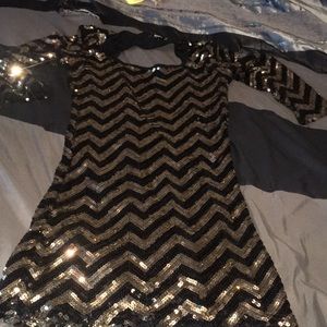 Black and gold sequence dress